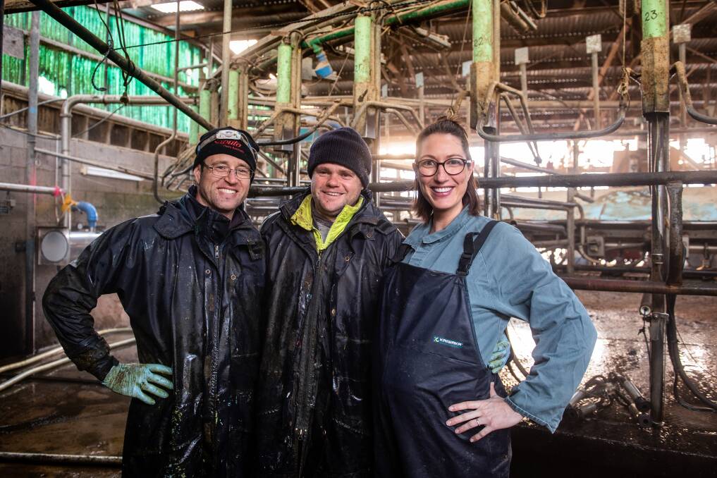 TEAMWORK: James Maxwell, Kerryn Powell and Amber Griffiths in their 50-stand rotary, one of two dairies on the farm they managed with the help of friends and staff members following the tragedy. PHOTO: Coralee Askew 