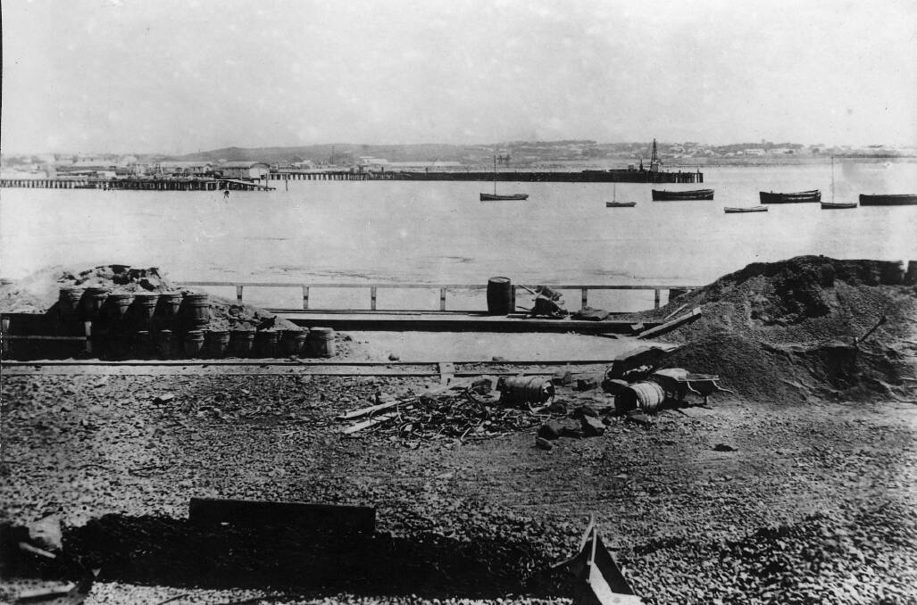 Construction of the breakwater. The rocks used in the construction came from Joseph Aberline's Wangoom farm.