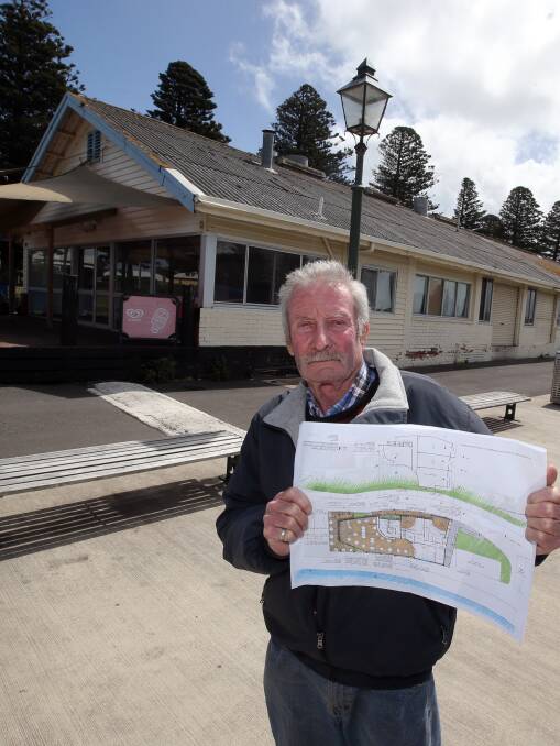 
PORT DECISION: Port of Port Fairy board member Bill Dalton last year with earlier redevelopment plans. Picture: DAMIAN WHITE
