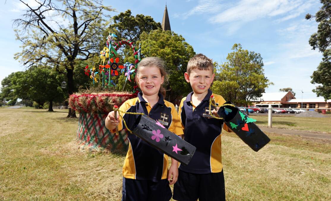 Lighting the way: Tarrington Lutheran School pupils Rubi Thomas, 5, and Heston Hedley, 6, with the lanterns they have made for Friday's Laternenfest parade.