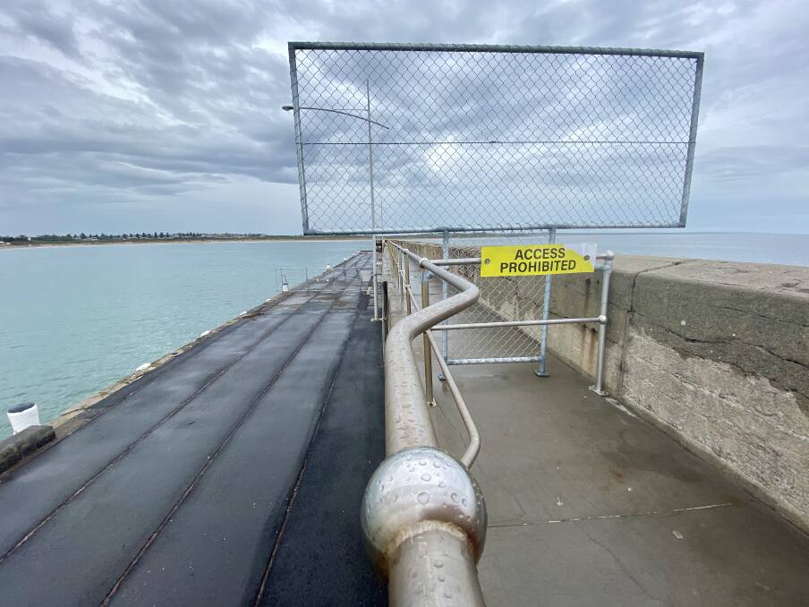 Keep out: New fencing keeping visitors out has been erected at the breakwater after vandals damaged what was there.