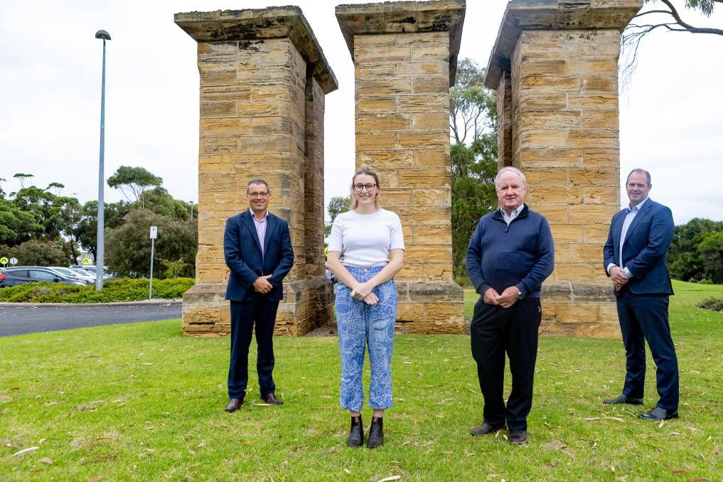 Deakin University's Alistair McCosh, intern Gaby Carty, Dr Barry Morphett and South West Healthcare CEO Craig Fraser celebrate the announcement of the Warrnambool campus now offering the full medical degree. Picture by Anthony Brady