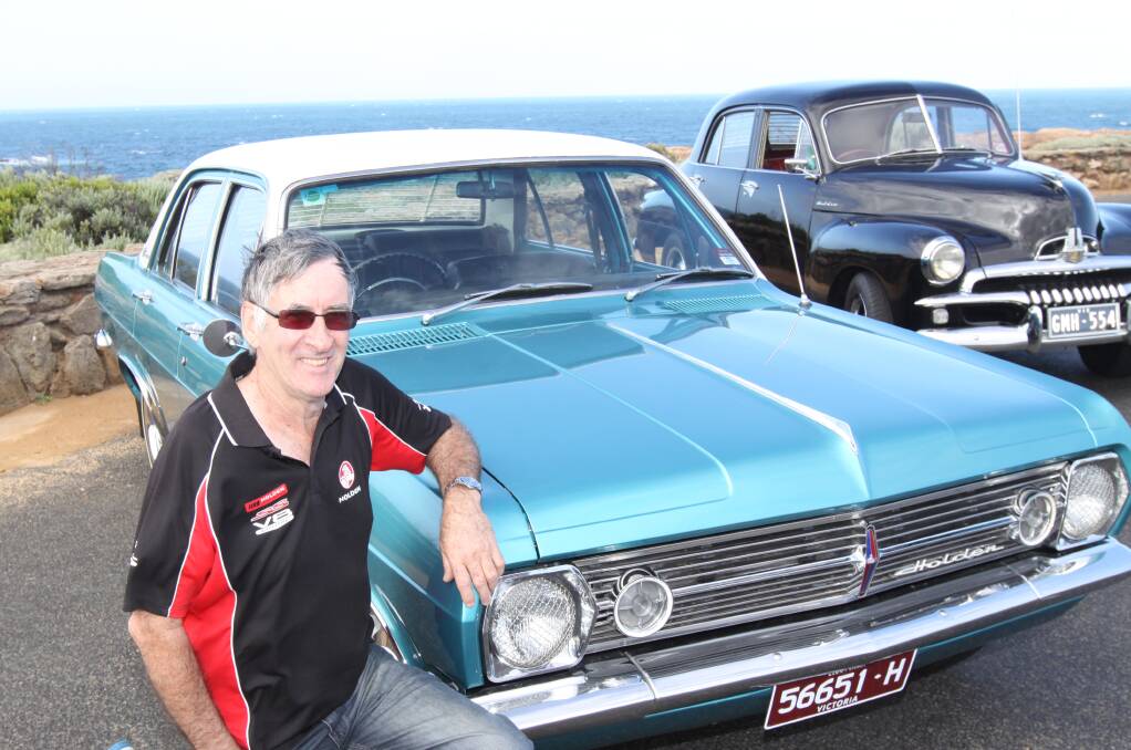 Show time: Ivan McGinness with his restored HR and FJ Holdens that will be on display at the Holden car club's show 'n' shine at Lake Pertobe on Saturday.