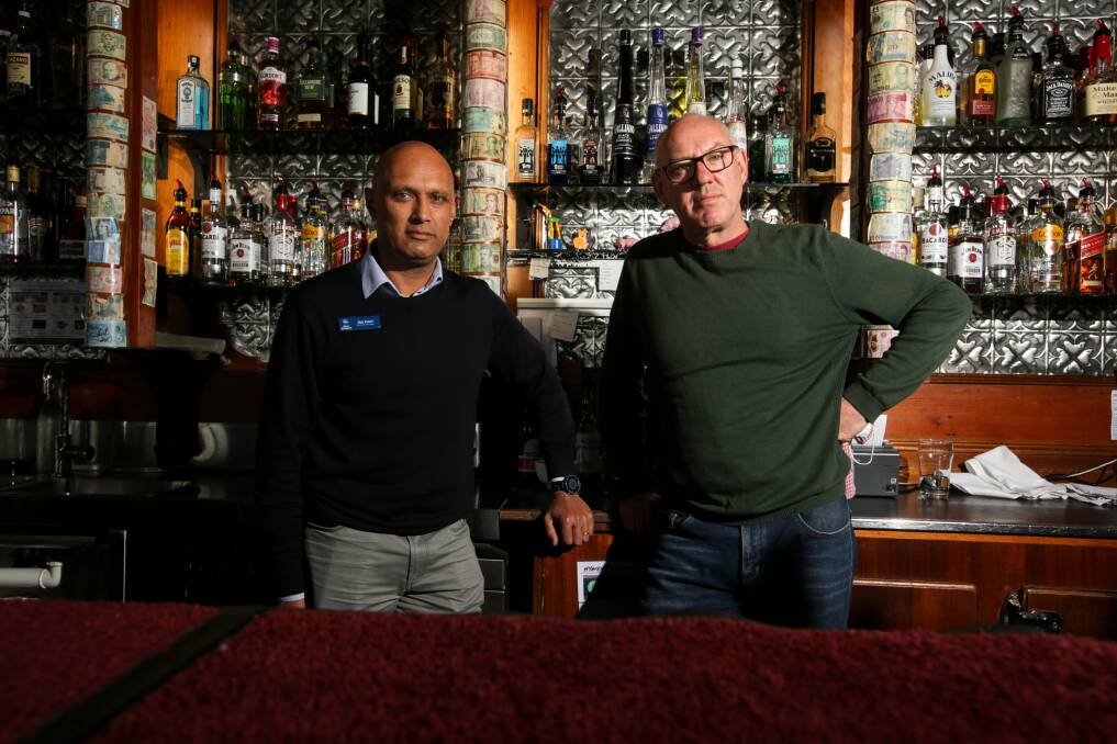 It's terrible: Raj Patel and Steven Phillpot, pictured in a file photo, have been hit hard by staff shortages as COVID sweeps through the city.