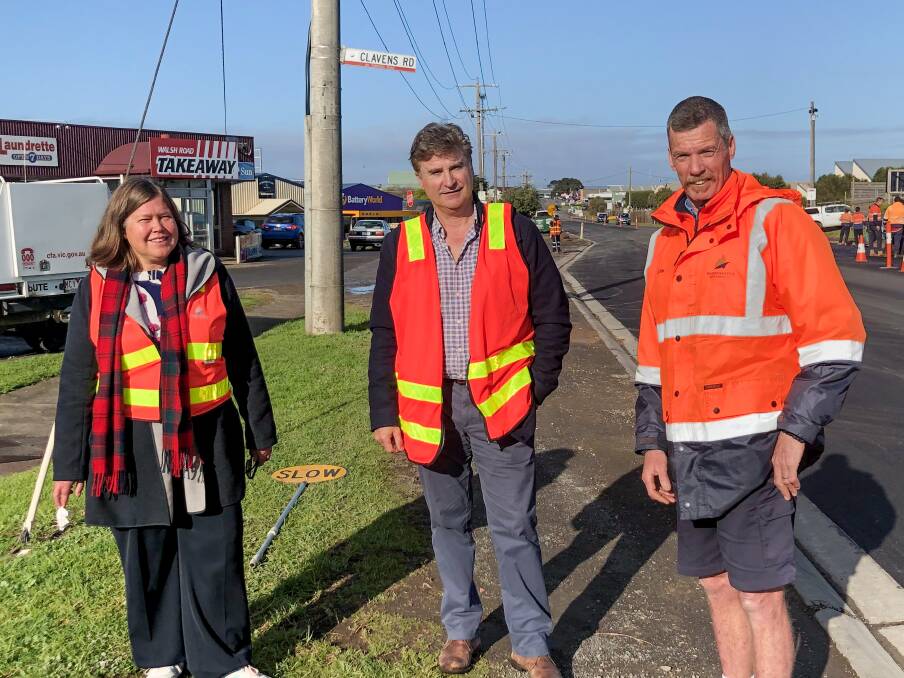 Mayor Tony Herbert with council workers at Walsh Road where recycled glass is being used to repair the road.