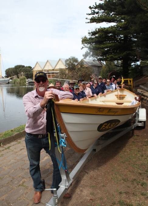 Ready to hit the water: Warrnambool St Ayles Skiff Club secretary Patrick Groot at the launch of the skiff built at Flagstaff Hill over the past 11 months.