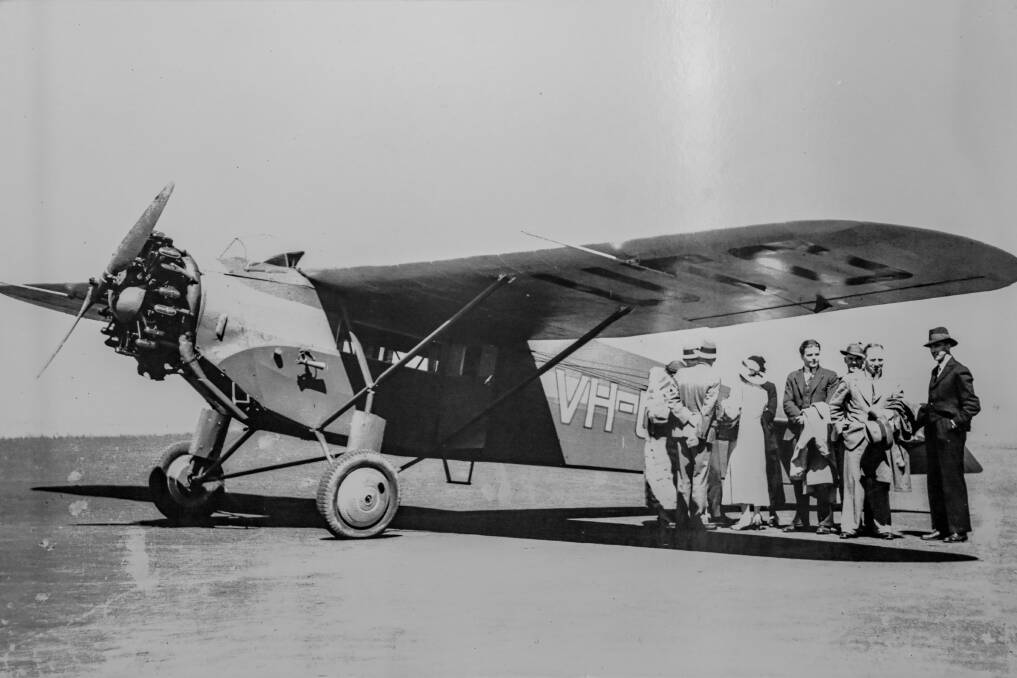 Beginning: Sir Reg Ansett with passengers who took the first flight from Hamilton to Melbourne in 1936 aboard a Fokker Universal.