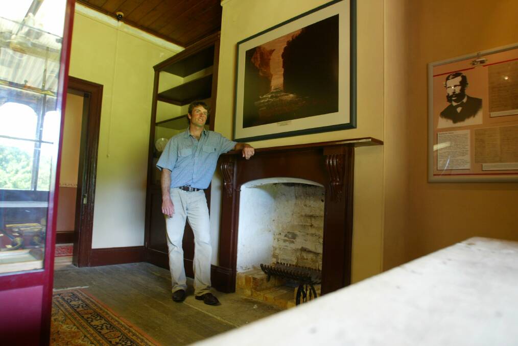 Richard Nesseler inside the historic homestead during an era when it was open to the public.
