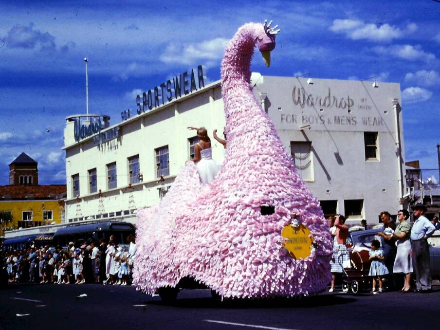 The streets of Warrnambool are lined with people for the Florado parade. Picture: Warrnambool and District Historical Society