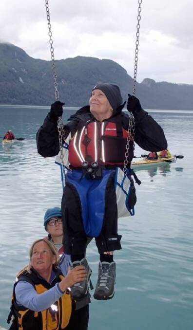 Warrnambool's Georgia Richmond being lifted into a kayak in Glacier Bay, Alaska. Now she will be able to do the same thing in Warrnambool with a new hoist on Hopkins River.