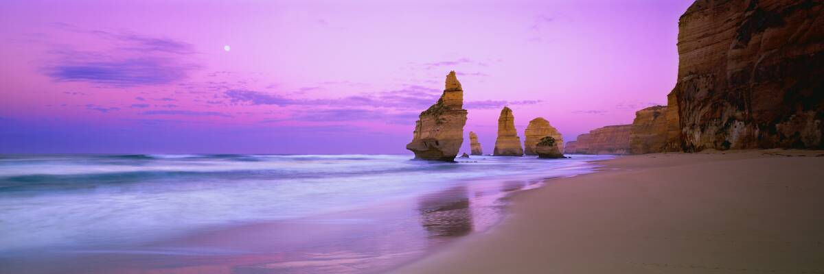 Ken Duncan was given special access to be able to capture panoramic images of the iconic 12 Apostles from the beach for the Sydney Olympics. Picture by Ken Duncan