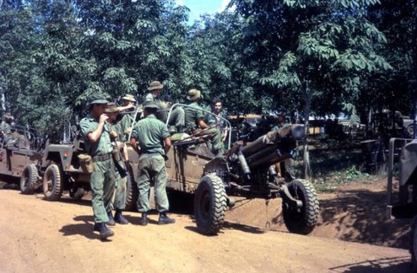 Ready: The 103rd battery guns about to leave the base during the Vietnam war. One gunner everyone thought had died of his wounds was found decades later.