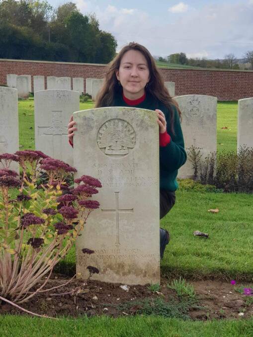 Faith Heijnen-McKinnon at the grave of her great, great uncle Private Daniel Meade who was killed in action during WWI. Picture supplied