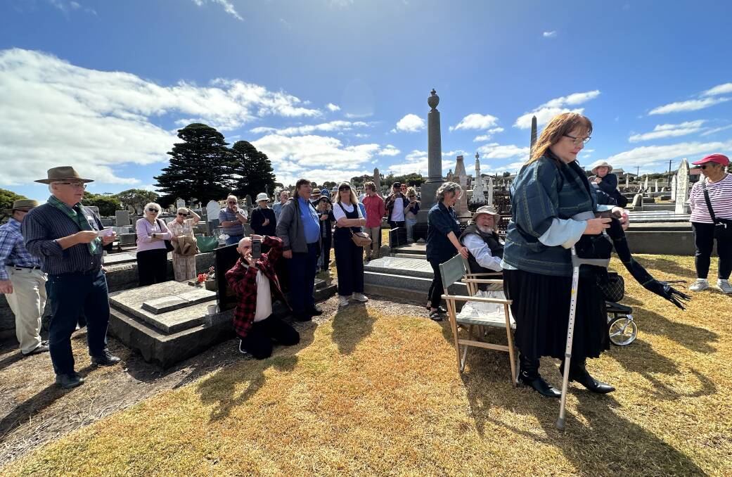 About 50 people gathered at the cemetery to mark the occasion. 