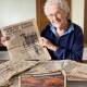 Marianne Tinker with a copy of The Standard when she made front page news on becoming a citizen in the 1970s. Picture by Katrina Lovell