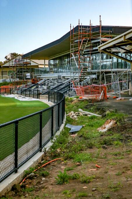 Taking shape: The scaffolding is soon to come down around the new pavilion at Reid Oval.
