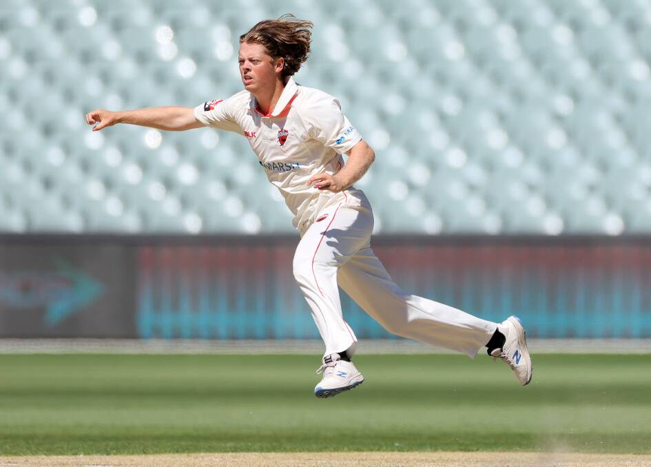 FLYING: Joe Medew-Ewen bowling for South Australia. Picture: Getty Images