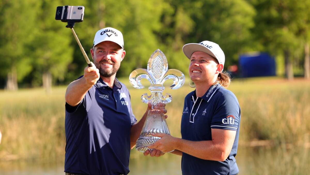 ALL SMILES: Marc Leishman and Cam Smith celebrate their victory at the Zurich Classic. Picture: Getty Images
