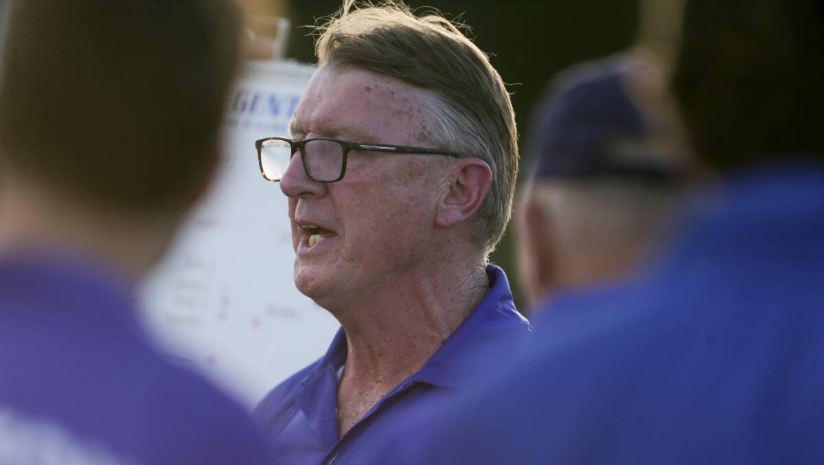 TRUST: Hamilton Kangaroos coach Gerard FitzGerald speaks to his side at a quarter break. Picture: Chris Doheny