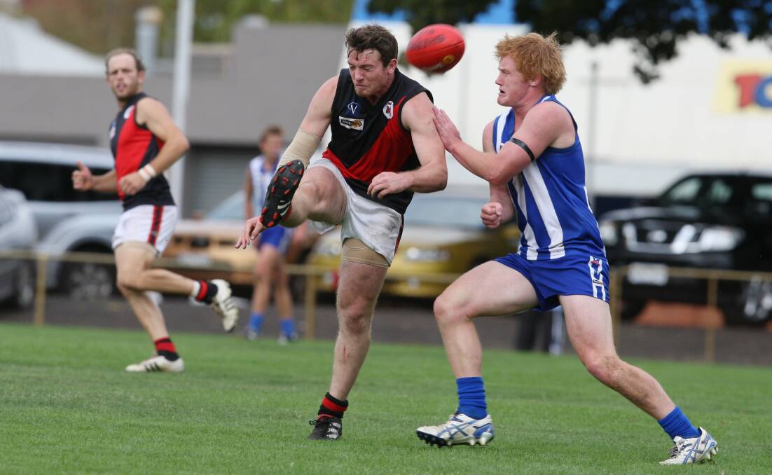 CRUNCH: Andrew Pepper pressures a Cobden opponent in his last stint at the club. 
