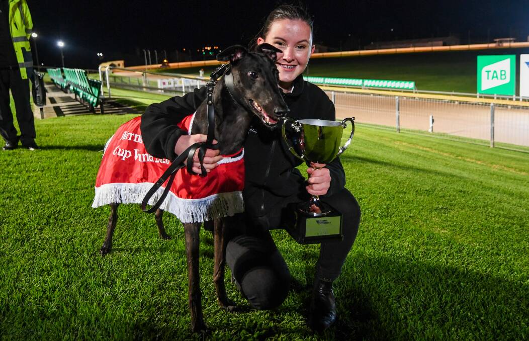 HAPPY DAYS: Handler Holly Thompson pictured with Warrnambool Cup winner Zambora Smokey. Pictures: Morgan Hancock