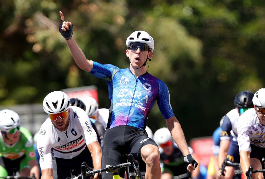 HAPPY DAYS: Cameron Scott celebrates winning his maiden Melbourne to Warrnambool Cycling Classic. Picture: Con Chronis
