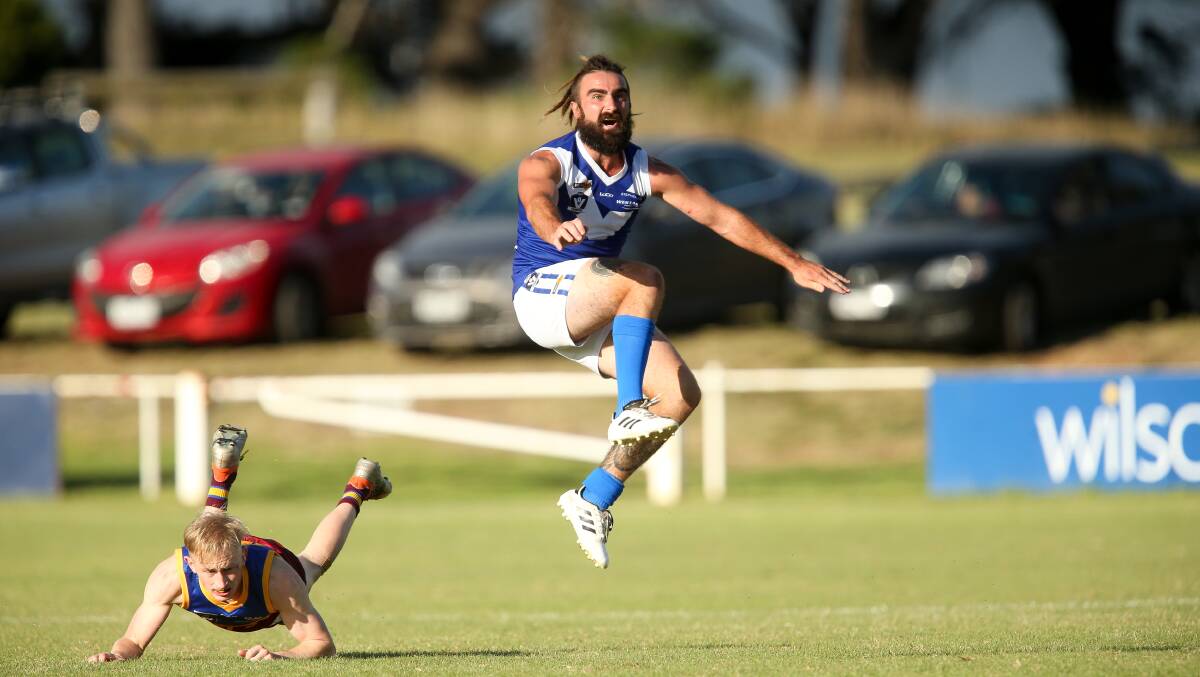 BACK IN: Russells Creek's Jayden Millet sends a long ball downfield. Millet is one of five changes for the Mack Oval-based club. Picture: Chris Doheny