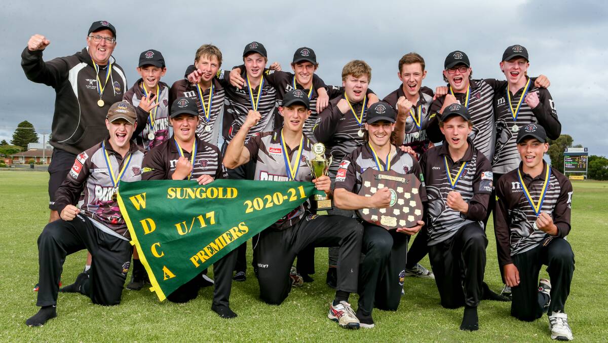 THREE OF THE BEST: West Warrnambool celebrates its under 17 premiership triumph. Picture: Chris Doheny