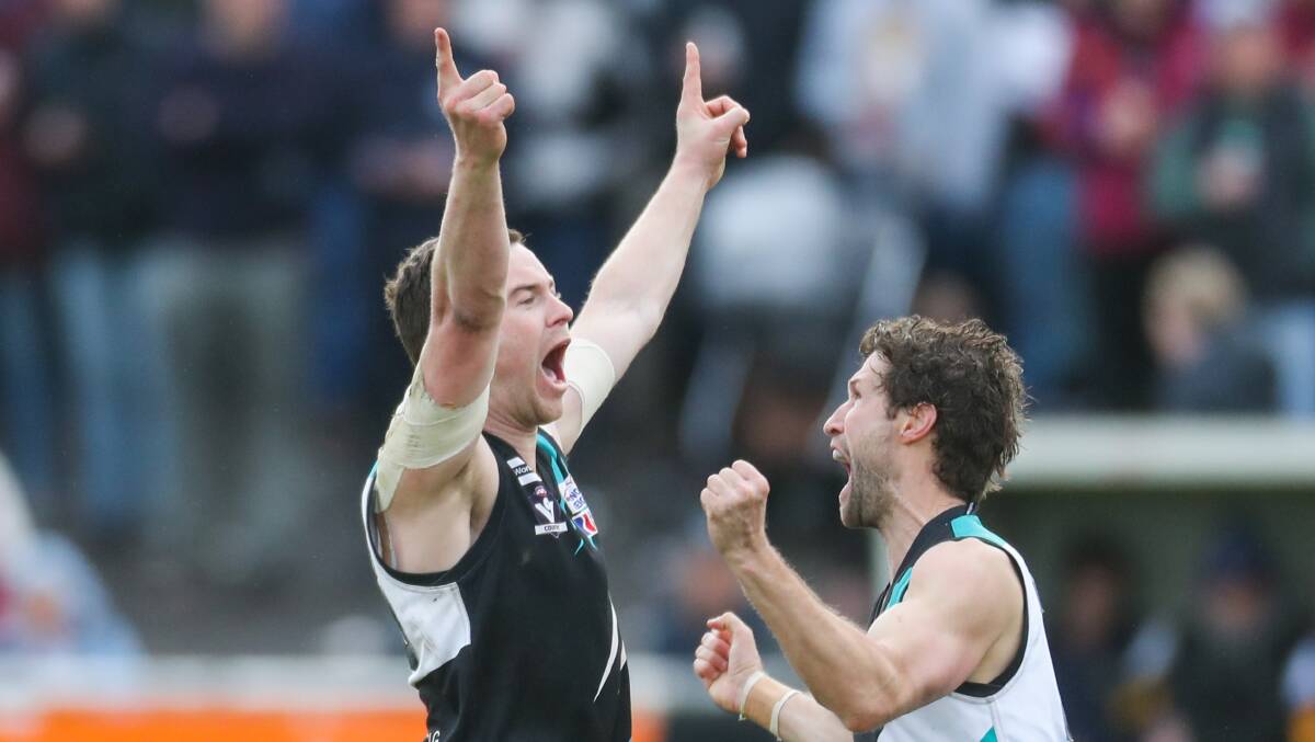 HAPPY TIMES: Nick Bourke celebrates with Jason Moloney after kicking a goal in the Power's 2019 grand final win. Picture: Morgan Hancock