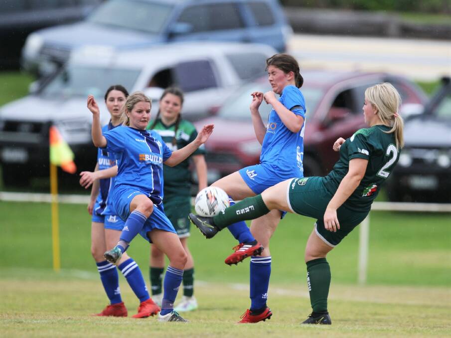 STUCK IN: Warrnambool Rangers' Shkara Rantall gets in for a tackle. Picture: Meg Saultry