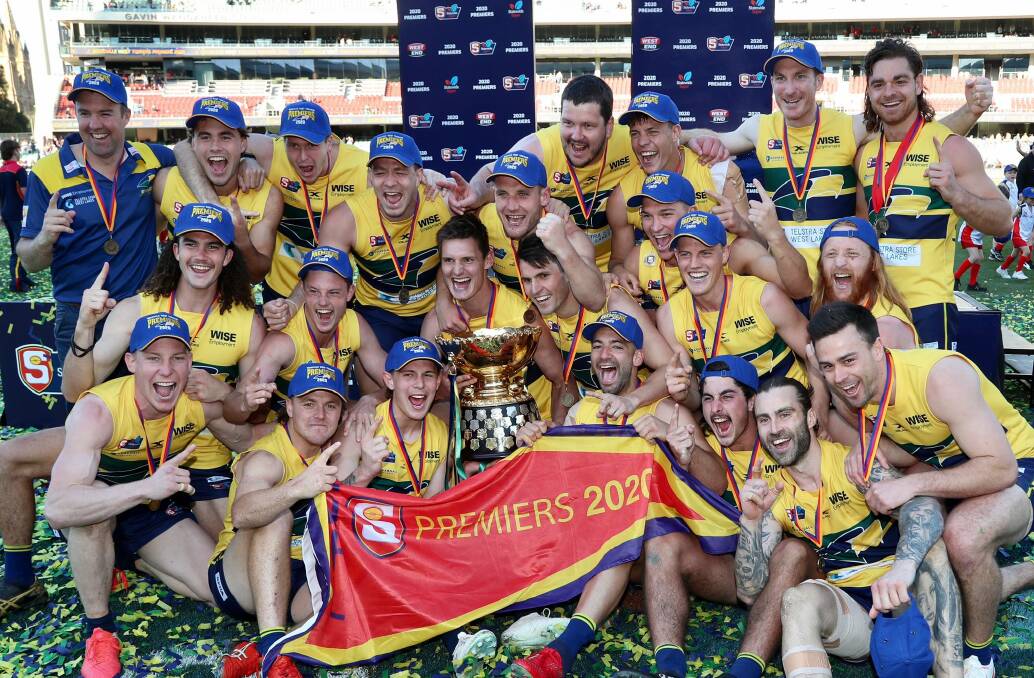 CHAMPIONS: Luke Thompson (third from left in middle row) celebrates the 2020 SANFL premiership with Woodville-West Torrens. Picture: SANFL