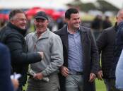 HAPPY AS LARRY: Henry Dwyer (right) celebrates Friday At Five's win. Picture: Morgan Hancock