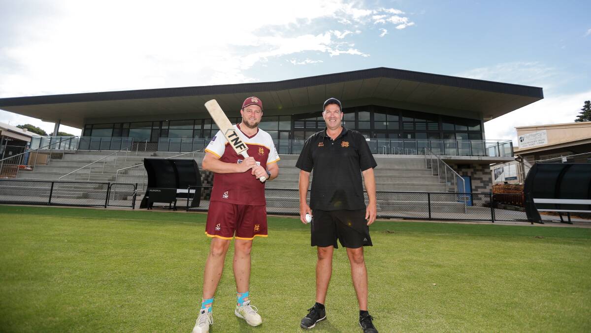 'WE'RE HOME': Nestles coach Alex Strauch and president Gary MacLean in front of the new Reid Oval pavilion. Picture: Anthony Brady