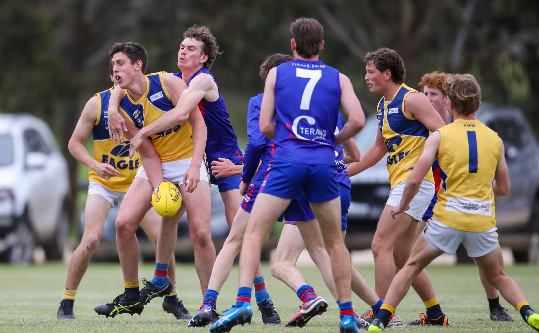 GET IT AWAY: North Warrnambool Eagles' Ben Kellett is wrapped up in a tackle. Picture: Morgan Hancock