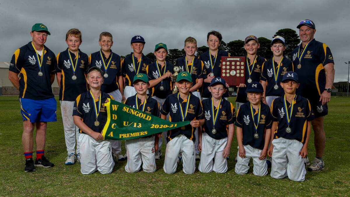 ALL SMILES: Mortlake-Cobden celebrates its under 13 flag. Picture: Chris Doheny