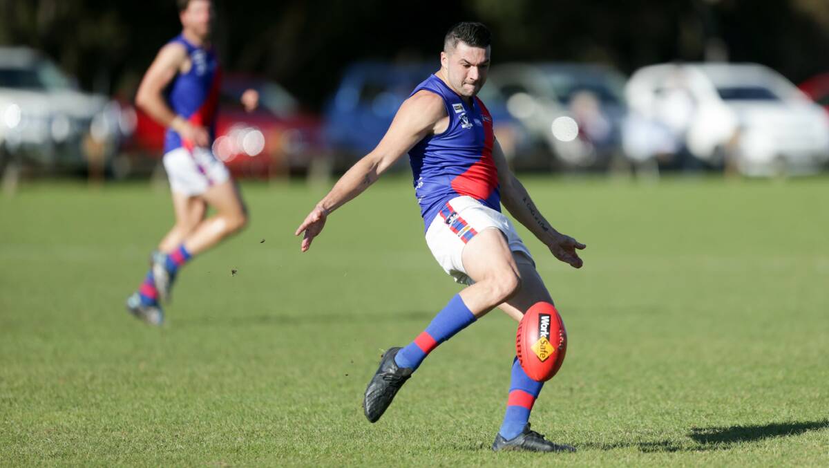 BOOT TO BALL: Terang Mortlake's Gus Bourke. Picture: Chris Doheny