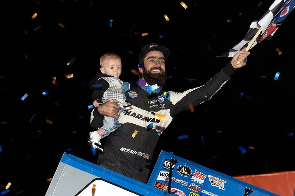 WINNER: Warrnambool's James McFadden celebrates a victory alongside baby Maverick at Skagit Speedway on the World of Outlaws tour. Picture: World Of Outlaws/Trent Gowers