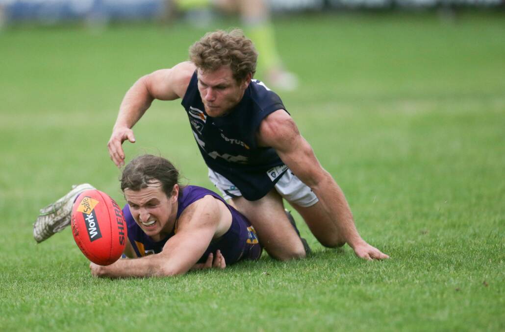SCARP: Port Fairy's Isaac Martin and Warrnambool's Jye Turland battle for the ball. Picture: Chris Doheny