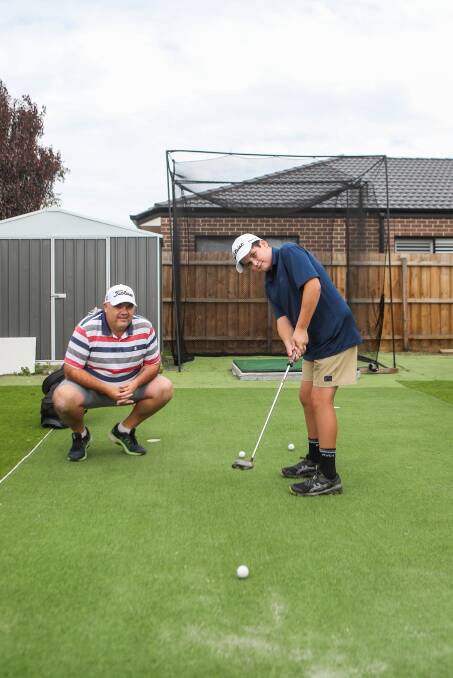 TOP JOB: Paul Walker and son Lachie have built a golf complex in their backyard to keep improving in lockdown. Picture: Morgan Hancock