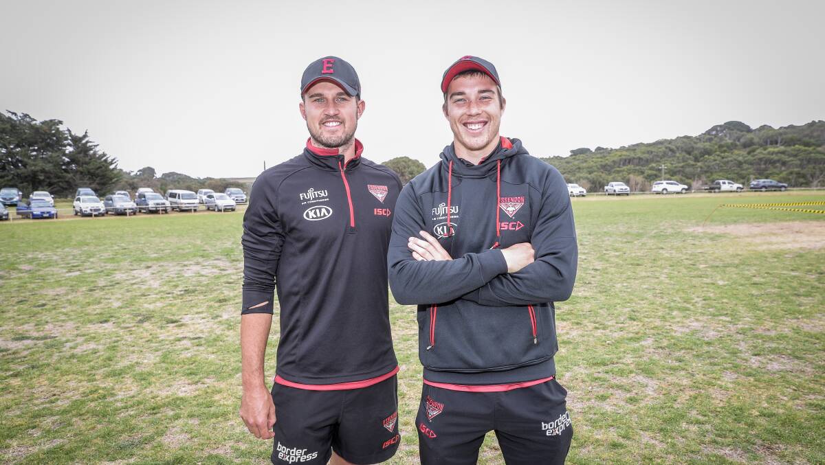 Jackson Merrett (left) with brother Zach when the pair were both listed at Essendon.