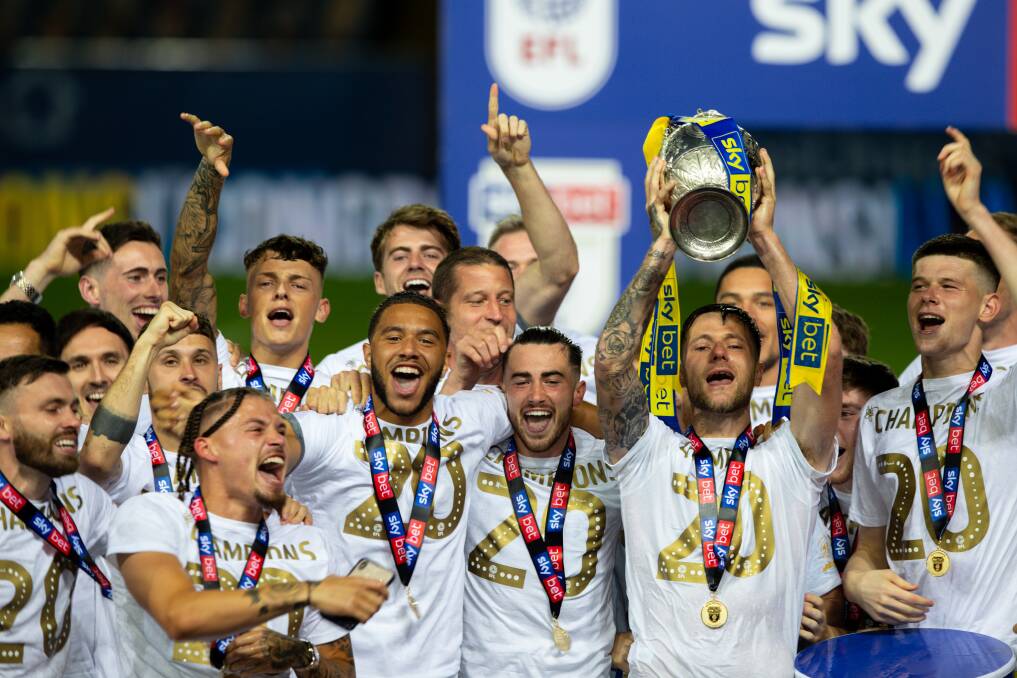 WHAT A SEASON: Leeds United celebrate winning English soccer's second tier to earn promotion back to the English Premier League. Picture: Getty Images