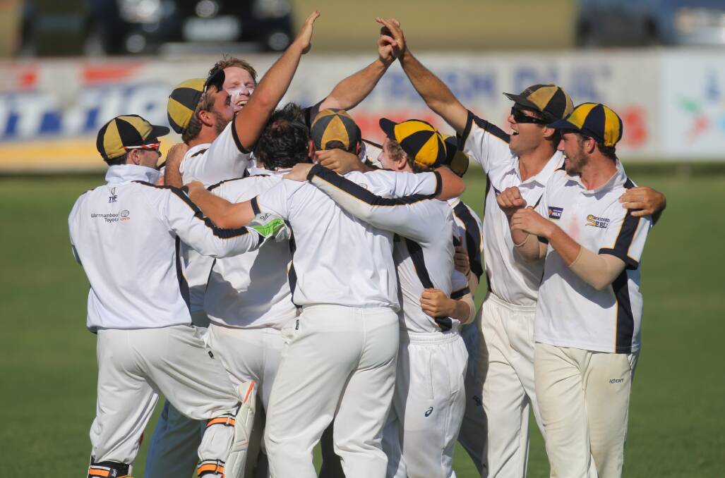 JOY: Woodford players celebrating the last wicket, which gave the club its third successive division one WDCA premiership. Pictures: Morgan Hancock