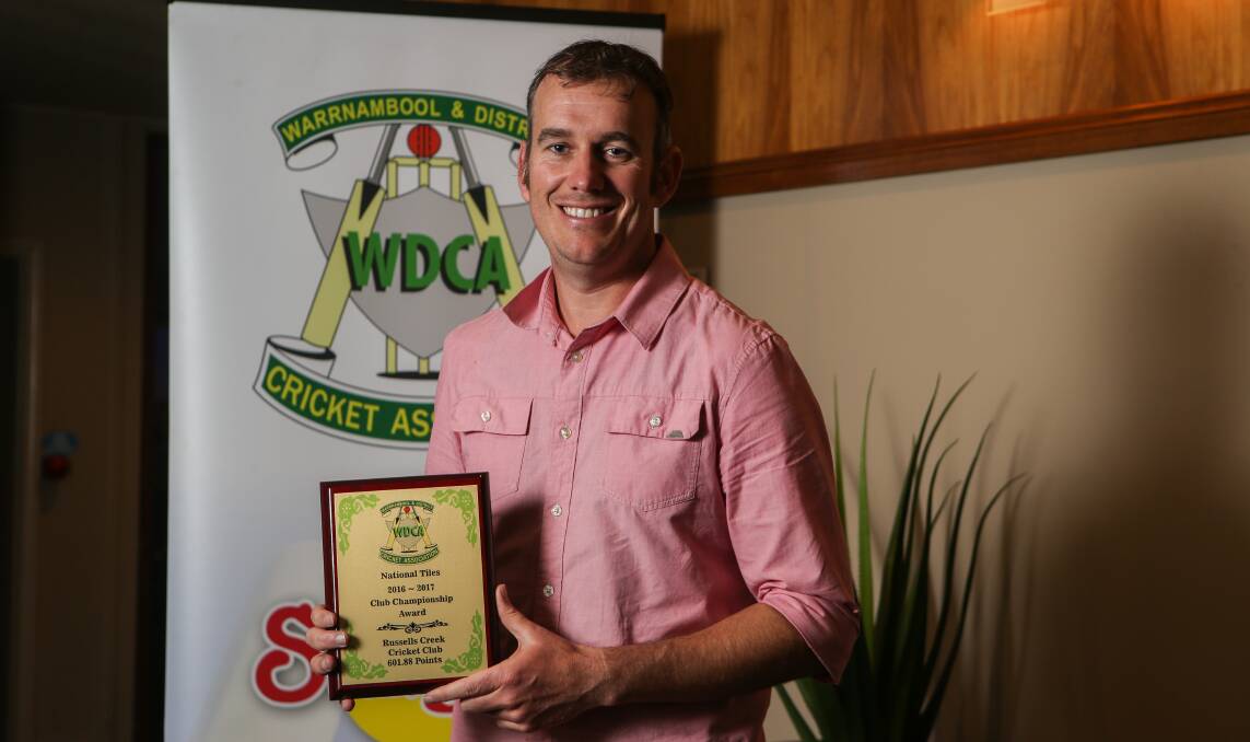 CLUB EFFORT: Russells Creek club president Nathan Divall with the WDCA club championship award. The club have two sides in grand finals this weekend.