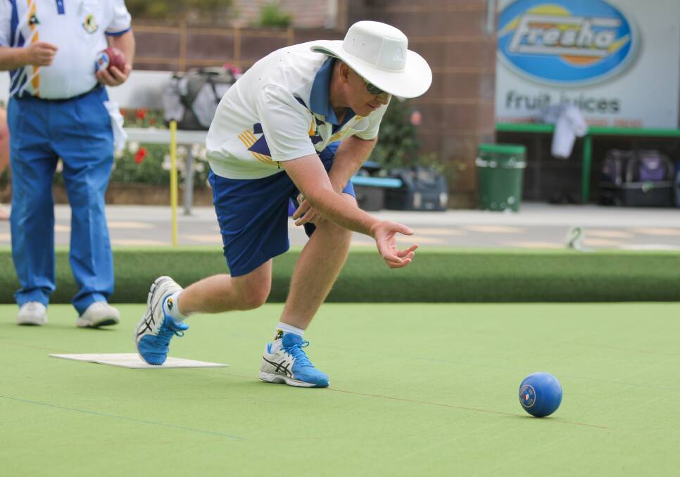 DOWN LOW: Michael Funcke of Minyip Bowling Club during the Des Notley Pairs at Warrnambool City Memorial Bowls Club. 