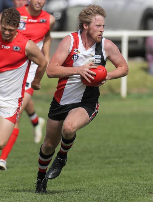 BIG INCLUSION: Koroit's Dallas Mooney bursts out of defence. He has returned after a wedding. Picture: Rob Gunstone