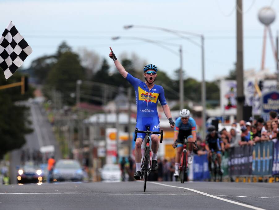 NUMBER ONE: Nathan Elliott celebrates crossing the finish line in first place. Picture: Rob Gunstone