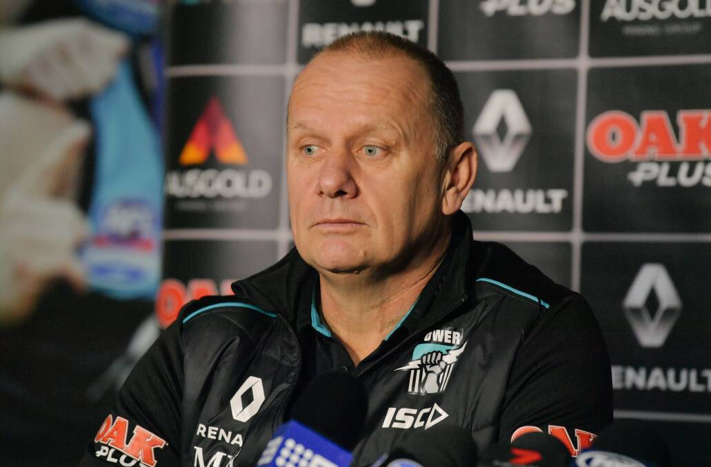 NEW DEAL: Port Adelaide coach Ken Hinkley is seen speaking at a media conference. Hinkley has announced he will stay until at least 2021.  Picture: AAP Image/Morgan Sette