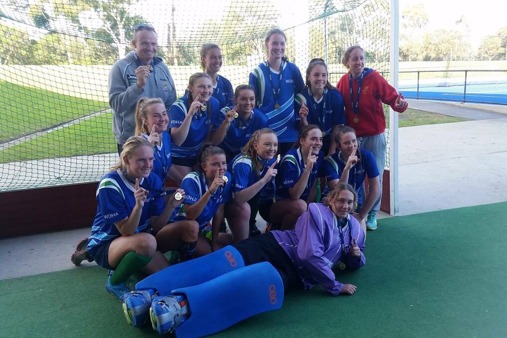 TOP OF THE CLASS: Warrnambool and District Hockey Association under 17 girls after winning the junior country championships title. Picture: Hockey Victoria.