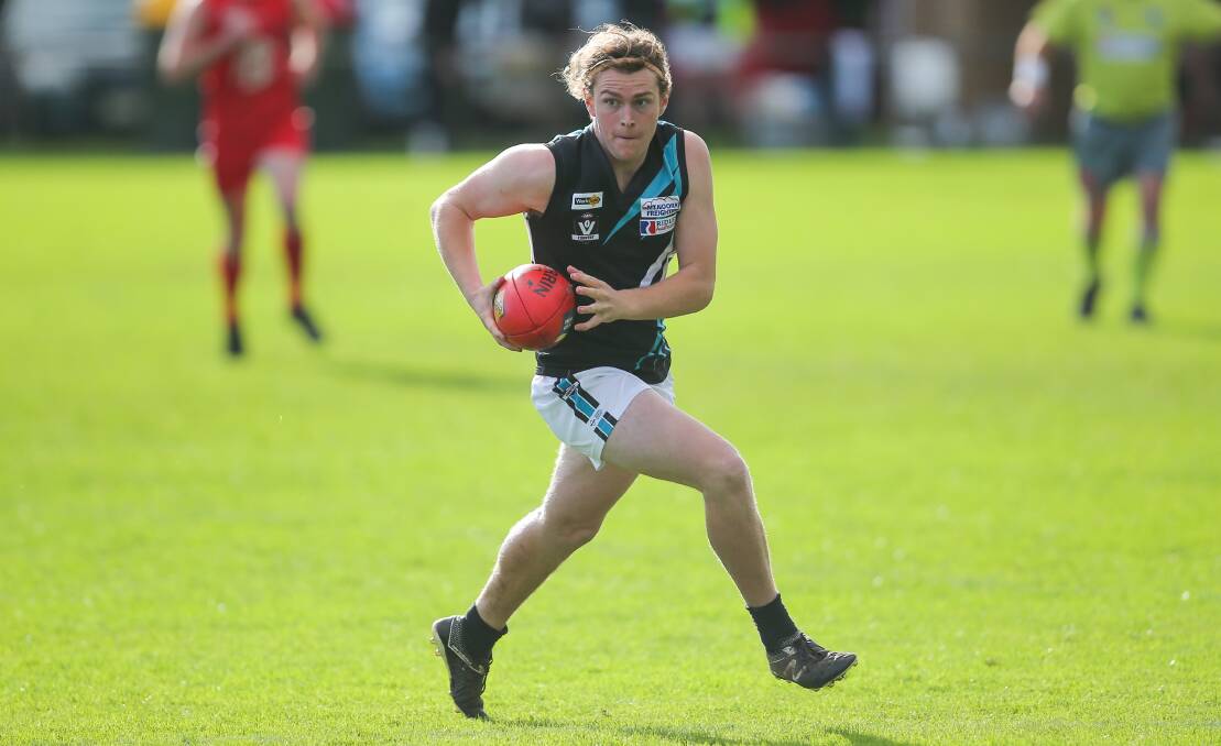 RUN AND CARRY: Kolora-Noorat's Will Carter runs with the ball. He booted four goals in his side's win over Allansford. Picture: Morgan Hancock