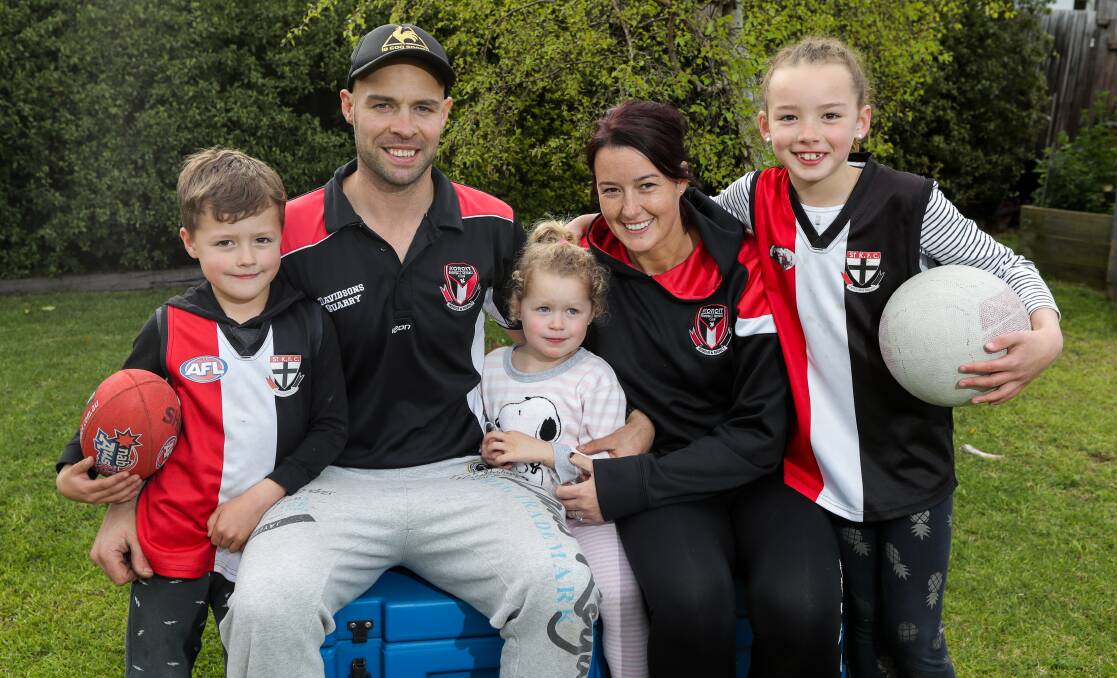Damian O'Connor and Jess O'Connor both played in grand finals for Koroit this year, supported by their kids Billy, 5, Remi, 3, and Indi, 7. Picture: Rob Gunstone
